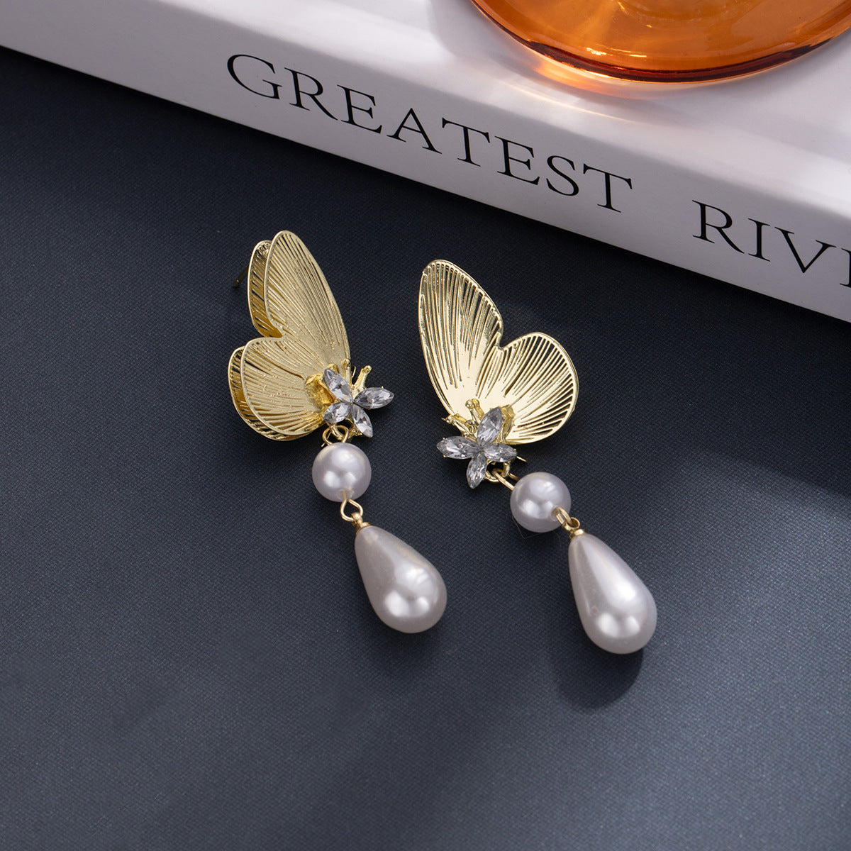 Wholesale Half butterfly drop tassel earrings