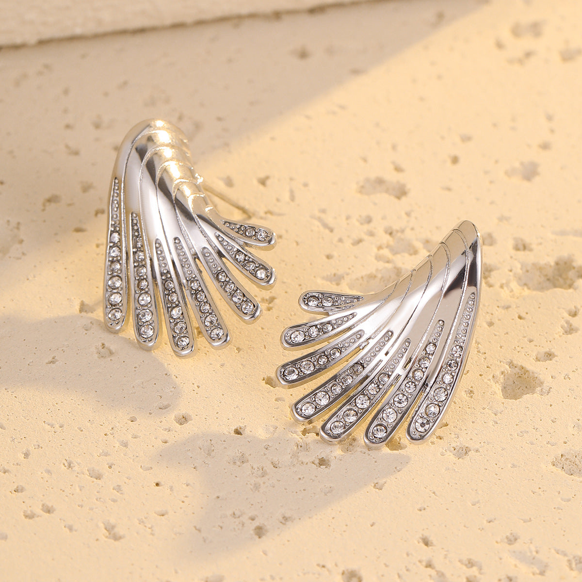 Wholesale exaggerated stainless steel irregular wings micro-inlaid zircon earrings