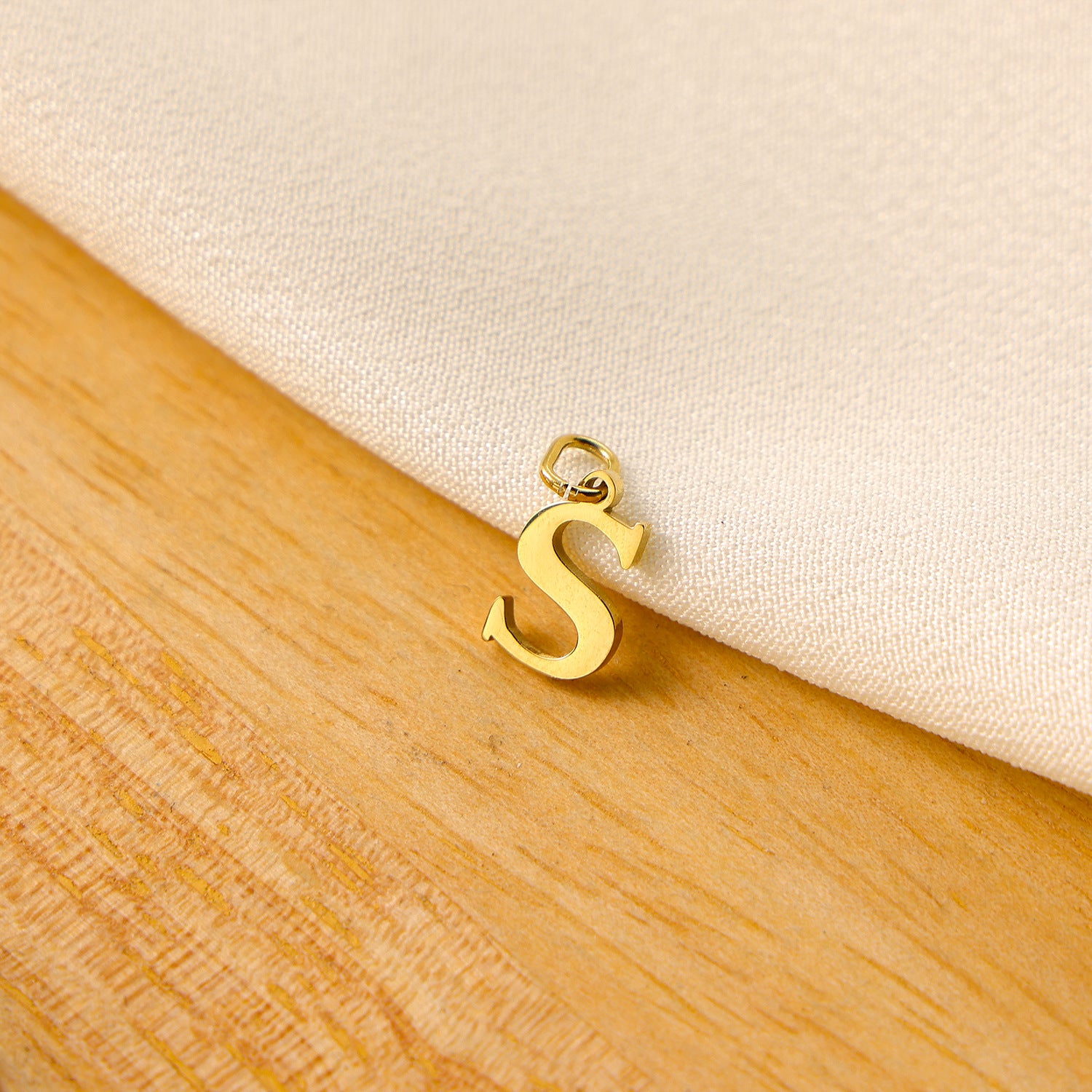 Wholesale Titanium steel letter pendant