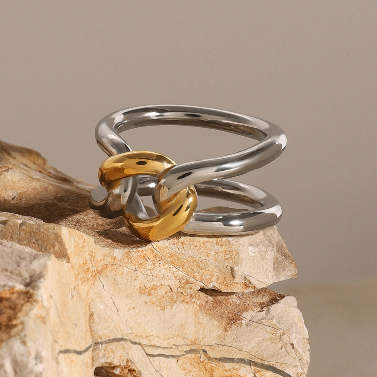 Wholesale 18k stainless steel gold and silver color matching design sense knot hollow color matching ring