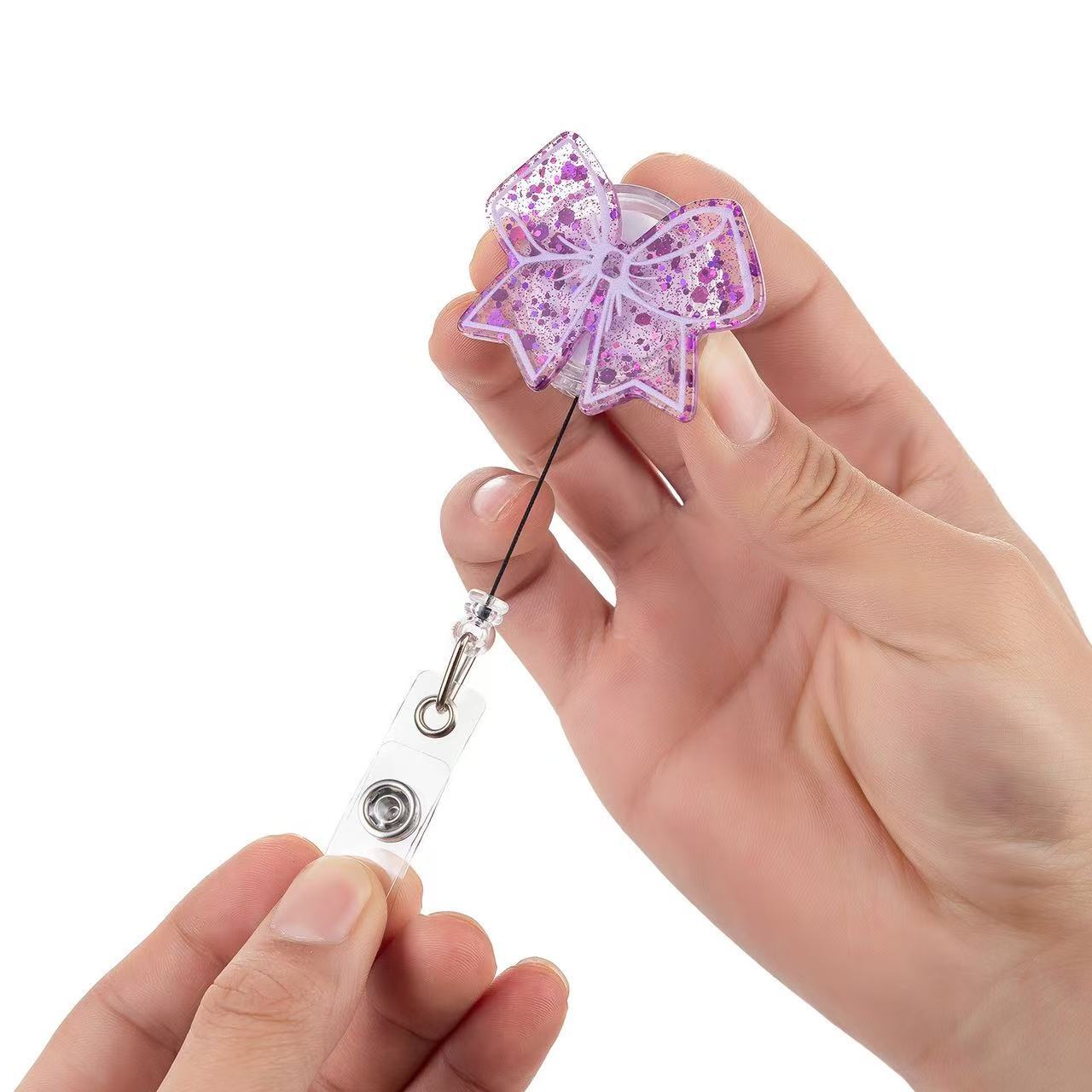 Wholesale acrylic pink bow retractable name tag clip  Badge Reels