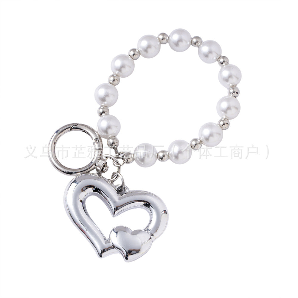 Wholesale Light Luxury Resin Alloy Peach Heart Pearl Keychains