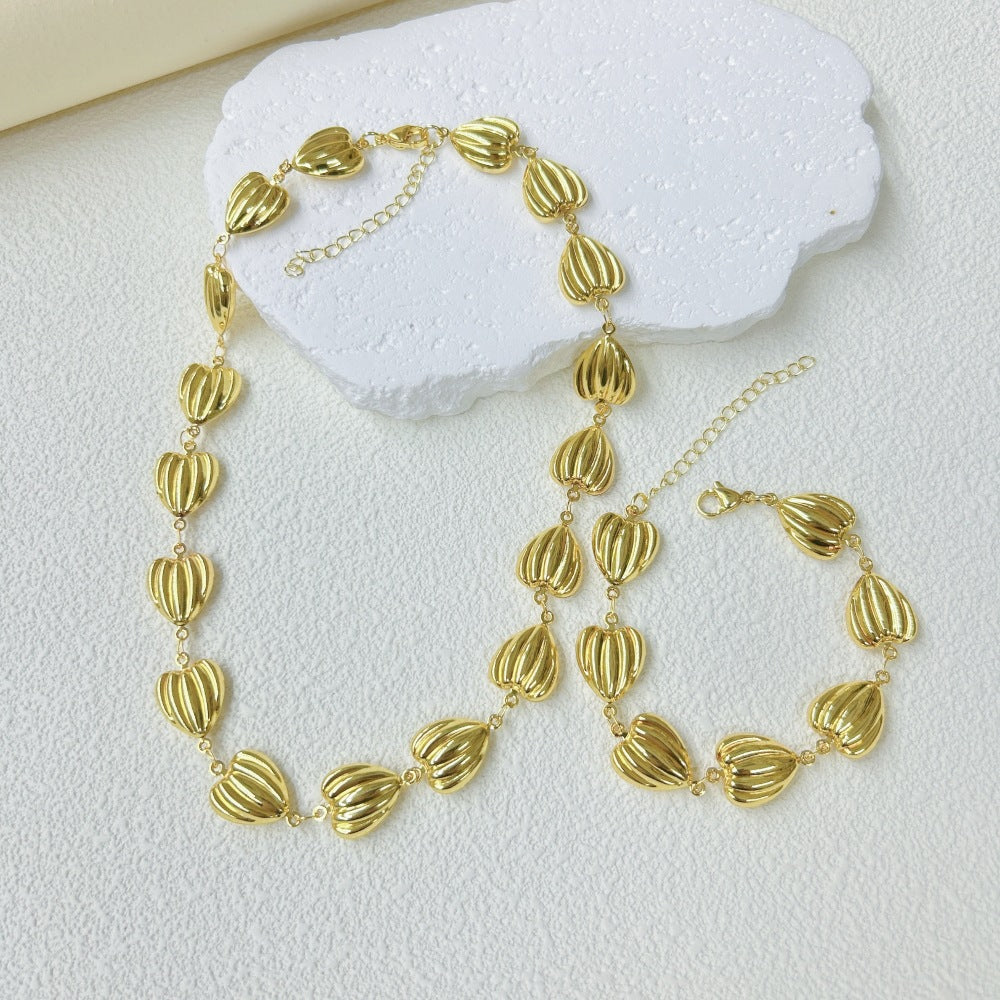 Wholesale Stainless Steel Three-dimensional Hollow Love Bracelet Necklace suit