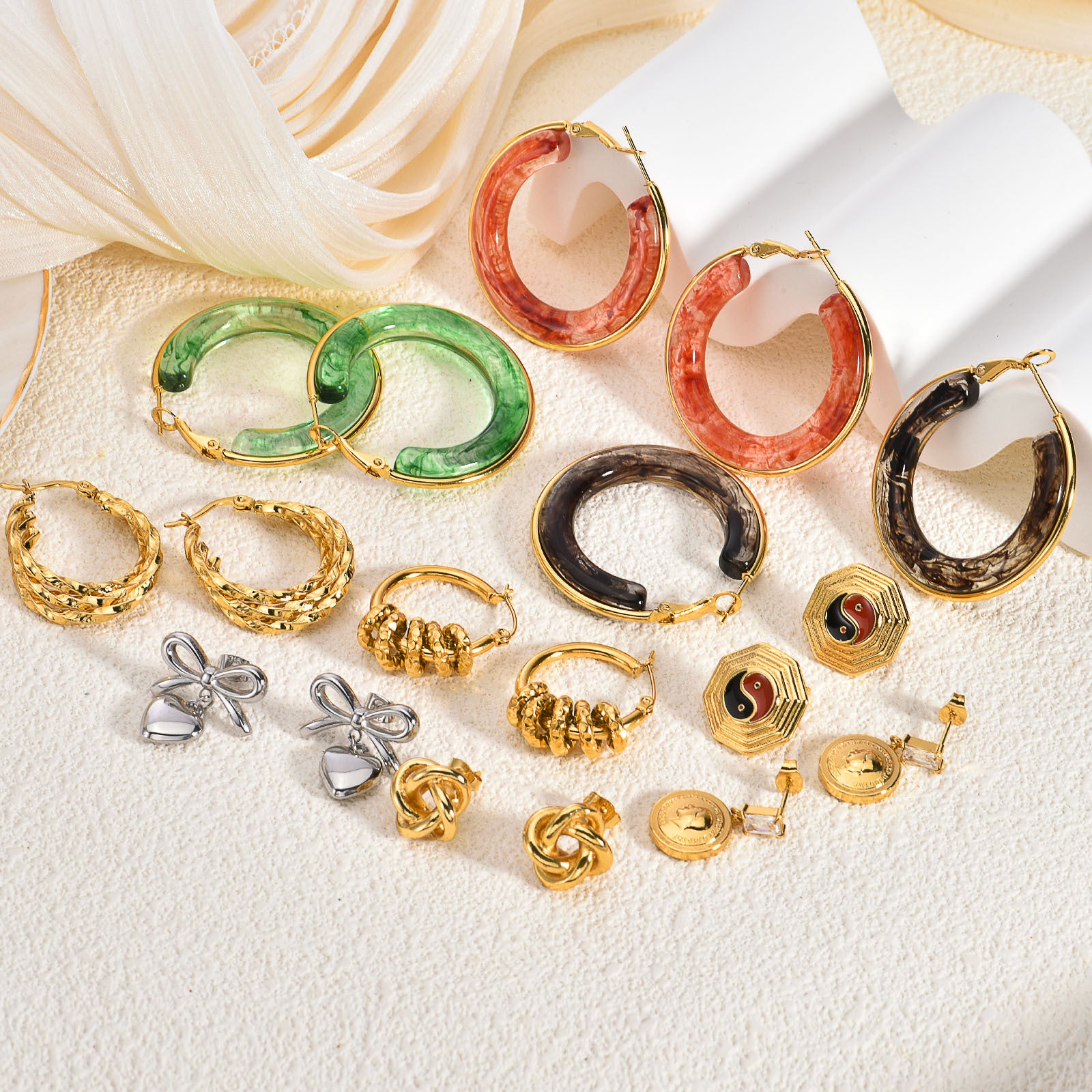 Wholesale Stainless steel cross cat eye earrings