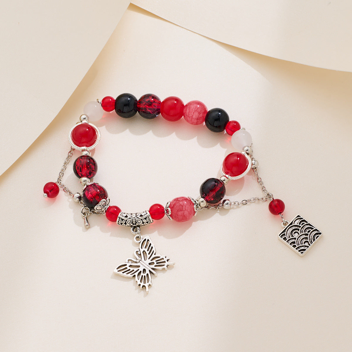 Bracciale con perline di farfalle e fiori all'ingrosso