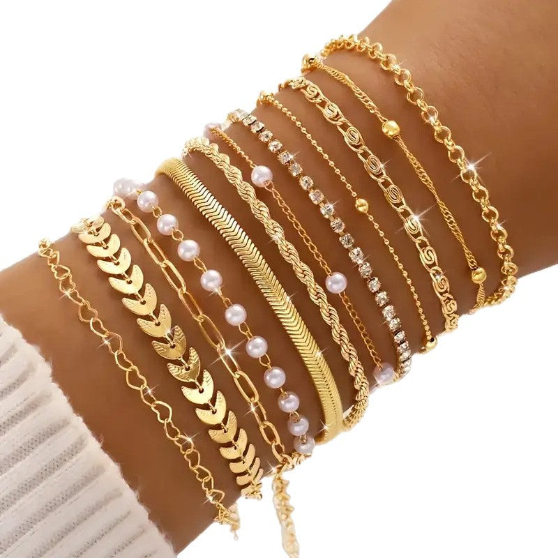 Wholesale Gold Tone 12 Piece Bracelet Set With Airplane Pearl Heart Designs Trendy Resale Jewelry Accessory