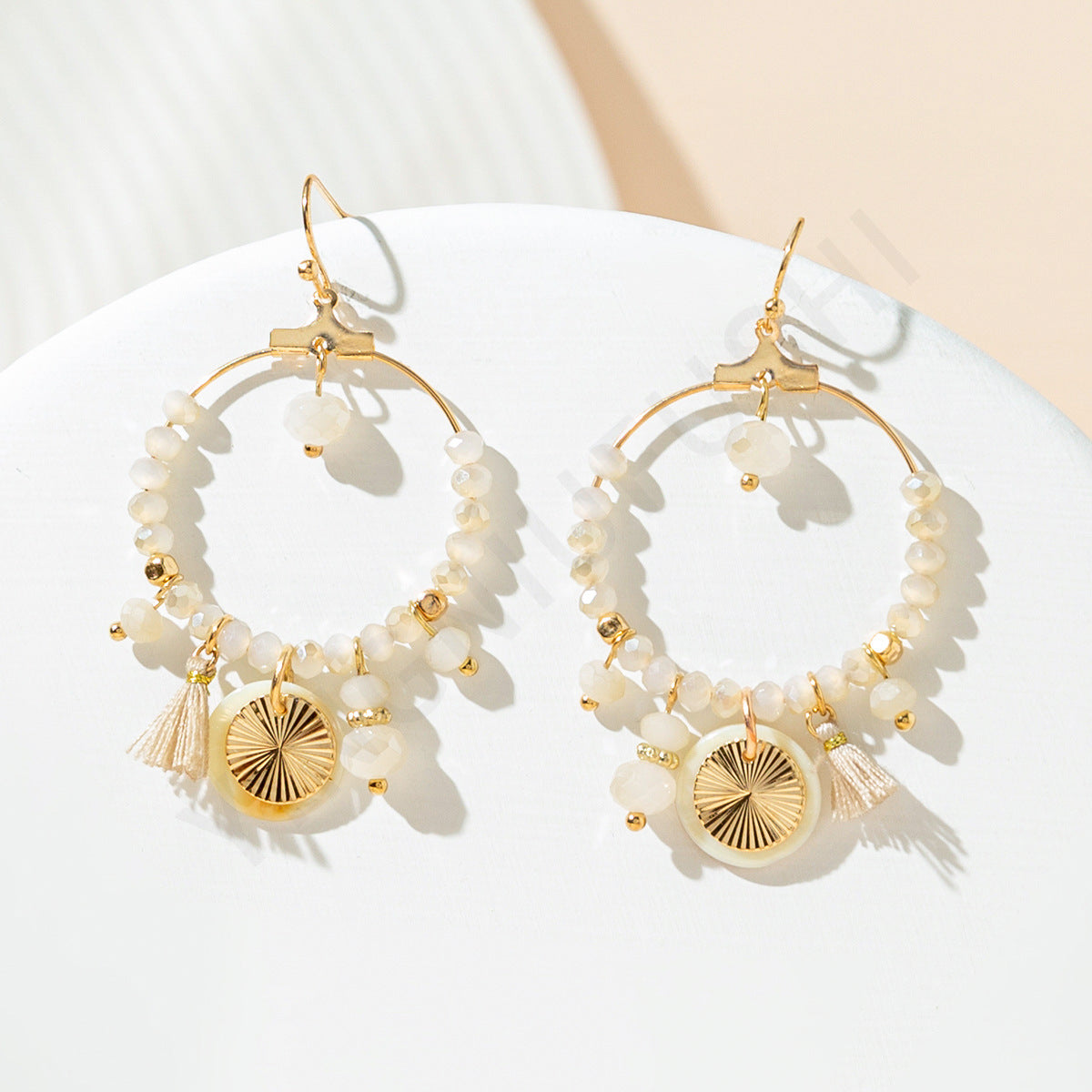 Wholesale  Bohemian Style Earrings Round Hollow Design Tassel Stainless Steel Earrings