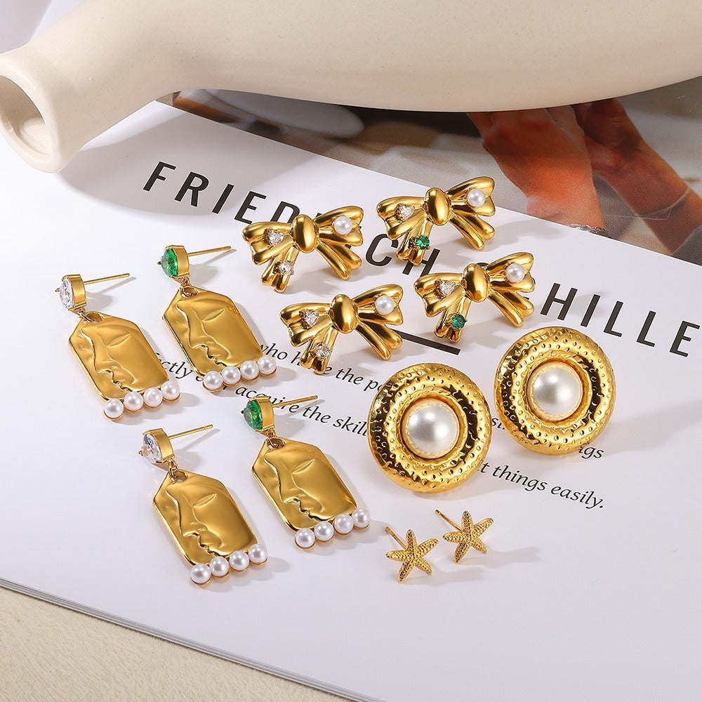 Wholesale Stainless steel man-made pearl bow heart earrings