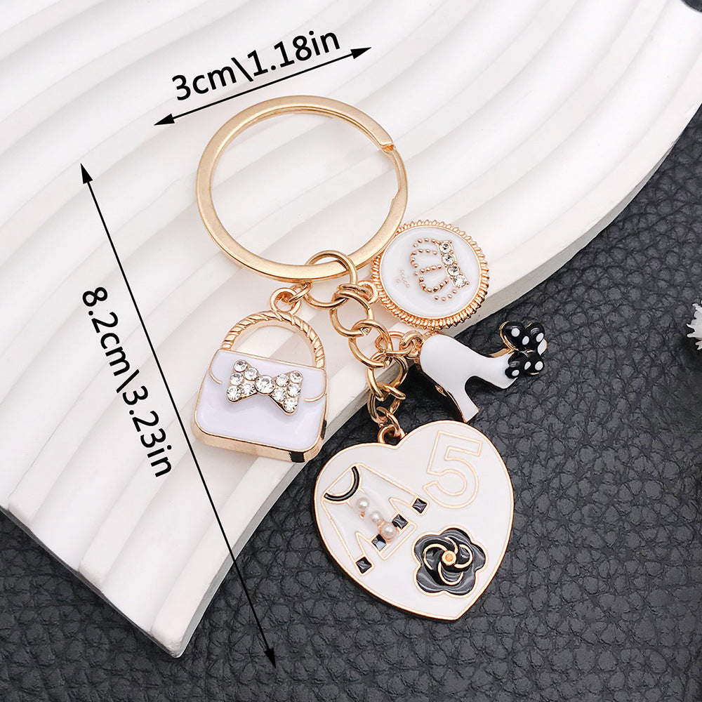 Wholesale White Oil Drop Bag Keychain ACC-KC-Luneng007