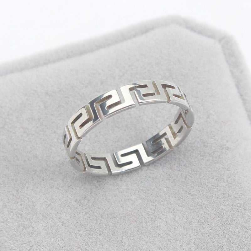 Wholesale simple hollow Great Wall pattern titanium steel ring