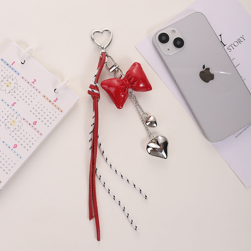 Wholesale Leather cord bow tassel keychain