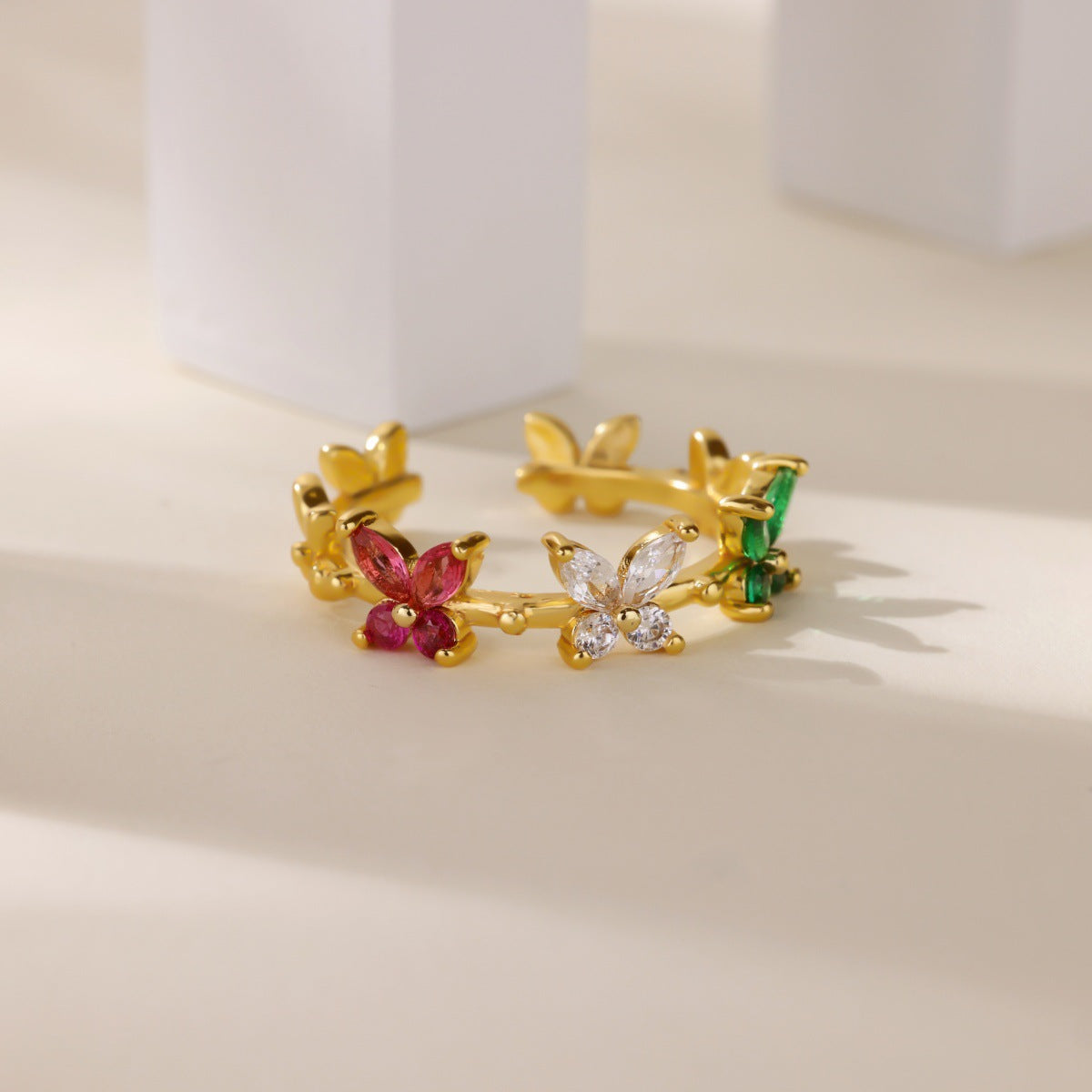 Wholesale Copper ring inlaid with colorful cubic zirconia in a butterfly and flower design