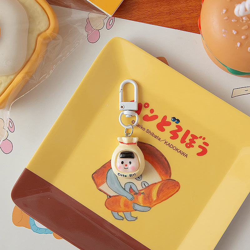 Couchette de dessin animé en gros porte-clés