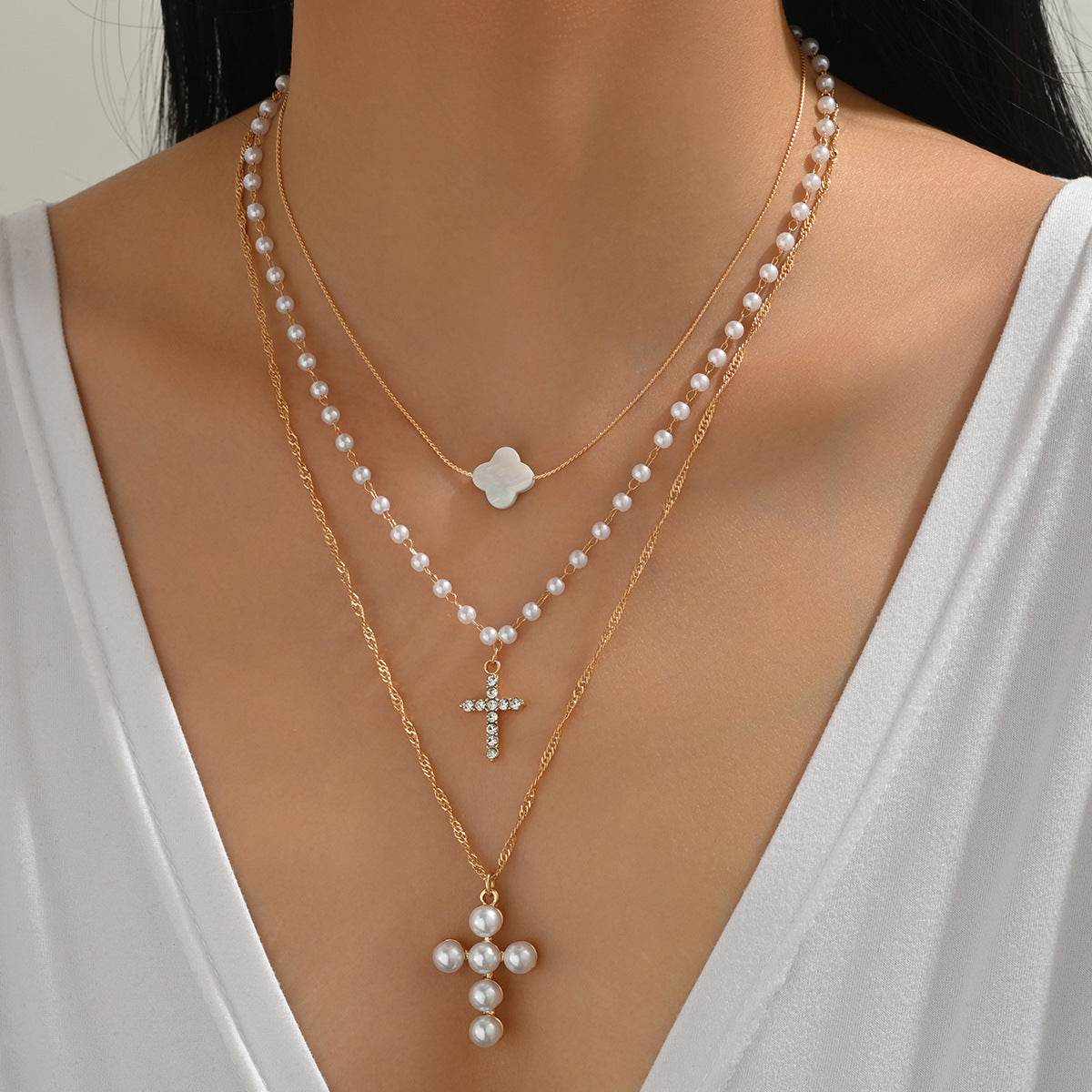 Collana all'ingrosso con pendente a forma di croce di perle di strass