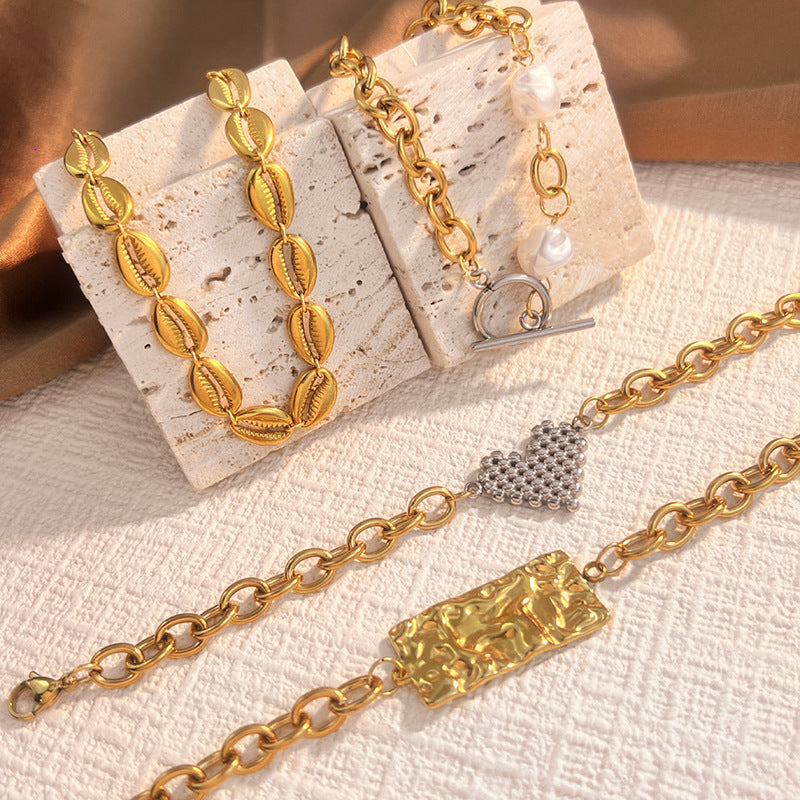 Wholesale Stainless steel bracelet with 18K gold plating,  geometric square and heart shape.