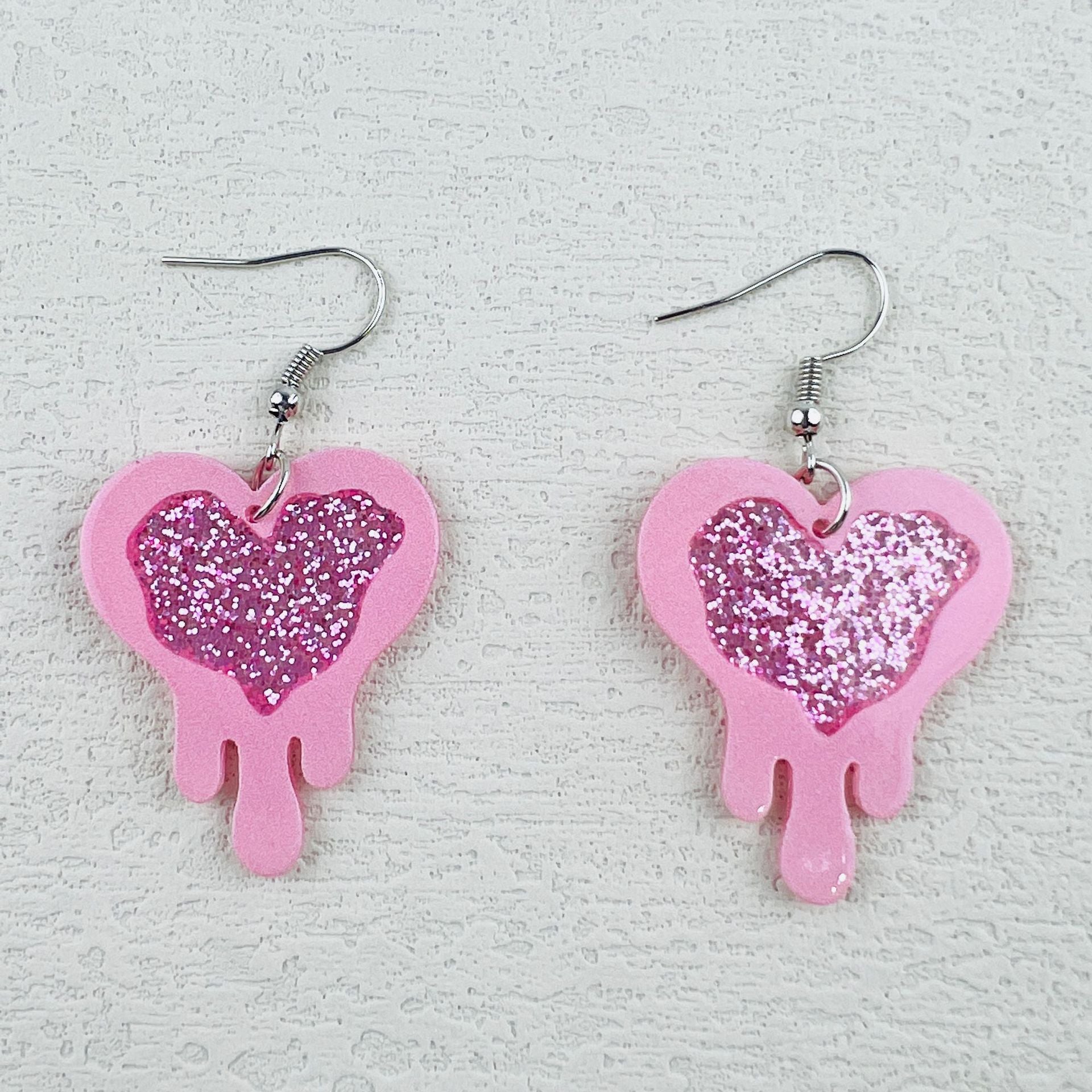 Wholesale Valentine's Day Glitter red melting heart acrylic earrings