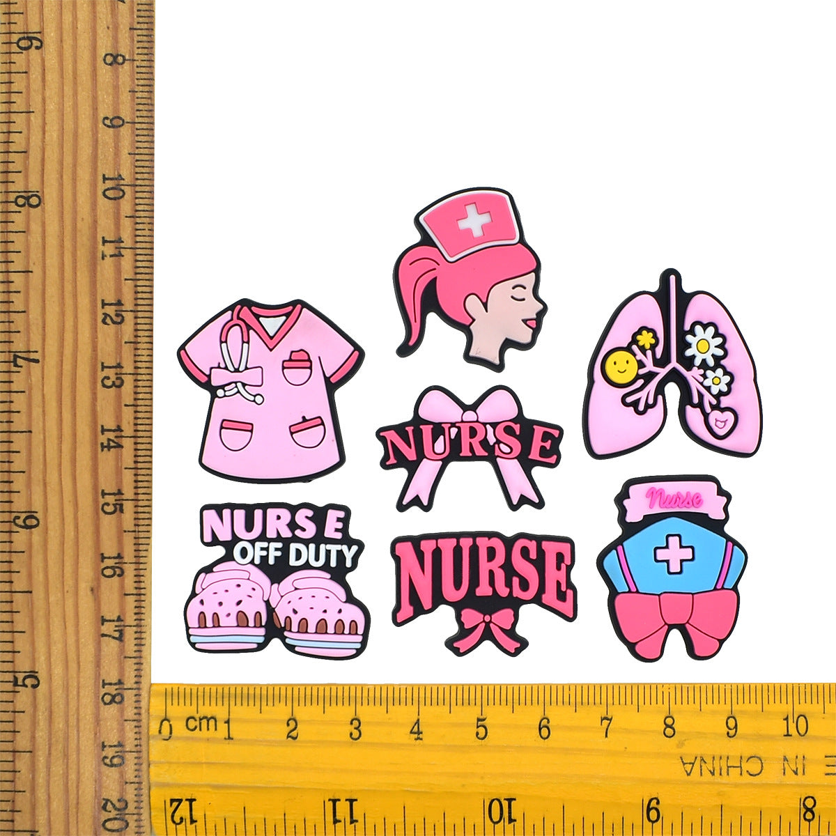 Decorazione casuale all'ingrosso della fibbia della scarpa in gomma morbida del PVC di serie del giorno degli infermieri da 100 pezzi