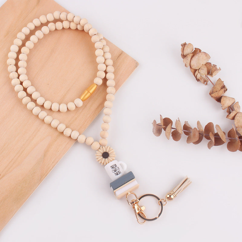 Wholesale Wooden Bead Necklace Keychain Silicone Daisy Book Beaded Tassel Necklace
