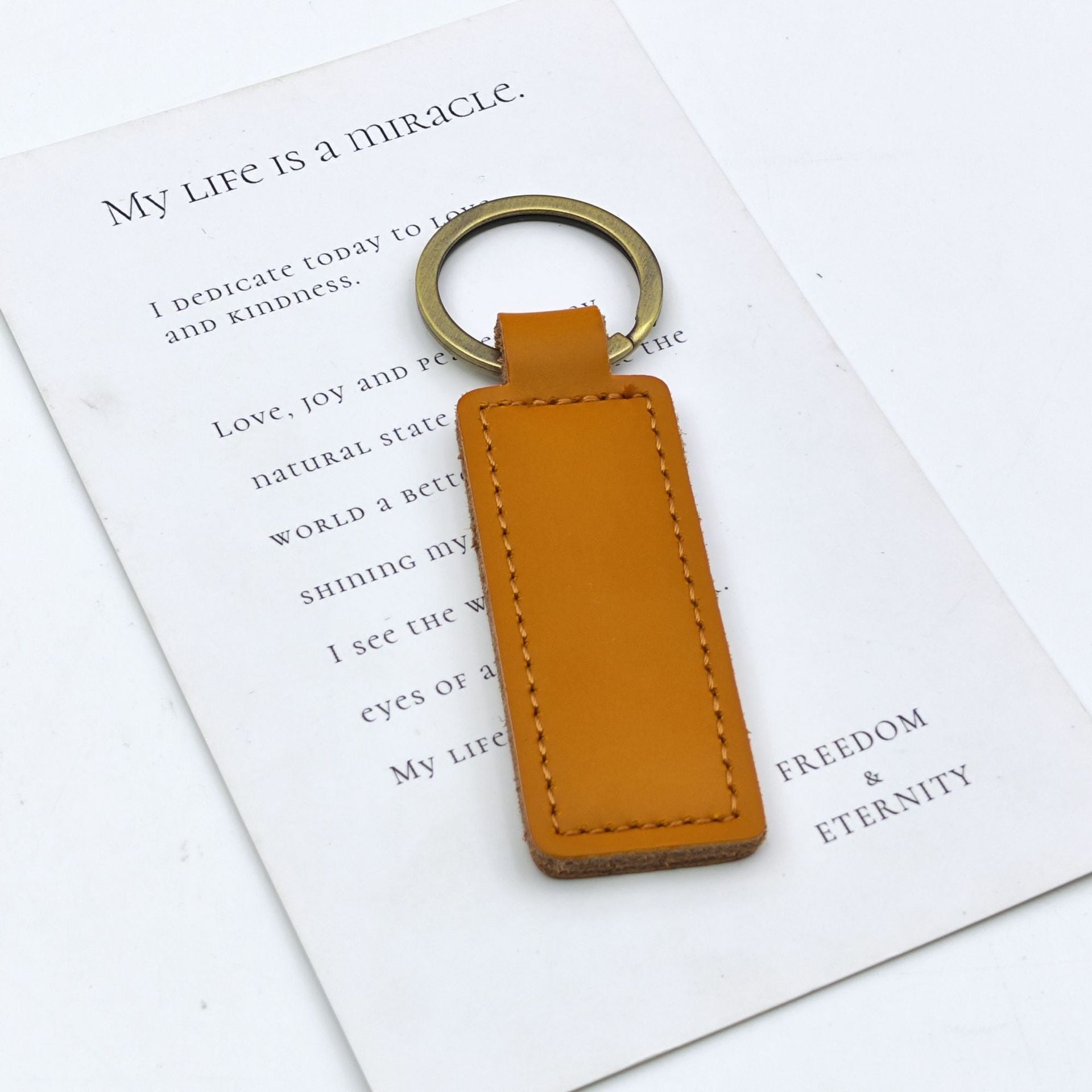 Wholesale  small gift cowhide car keychain leather pendant retro Keychains
