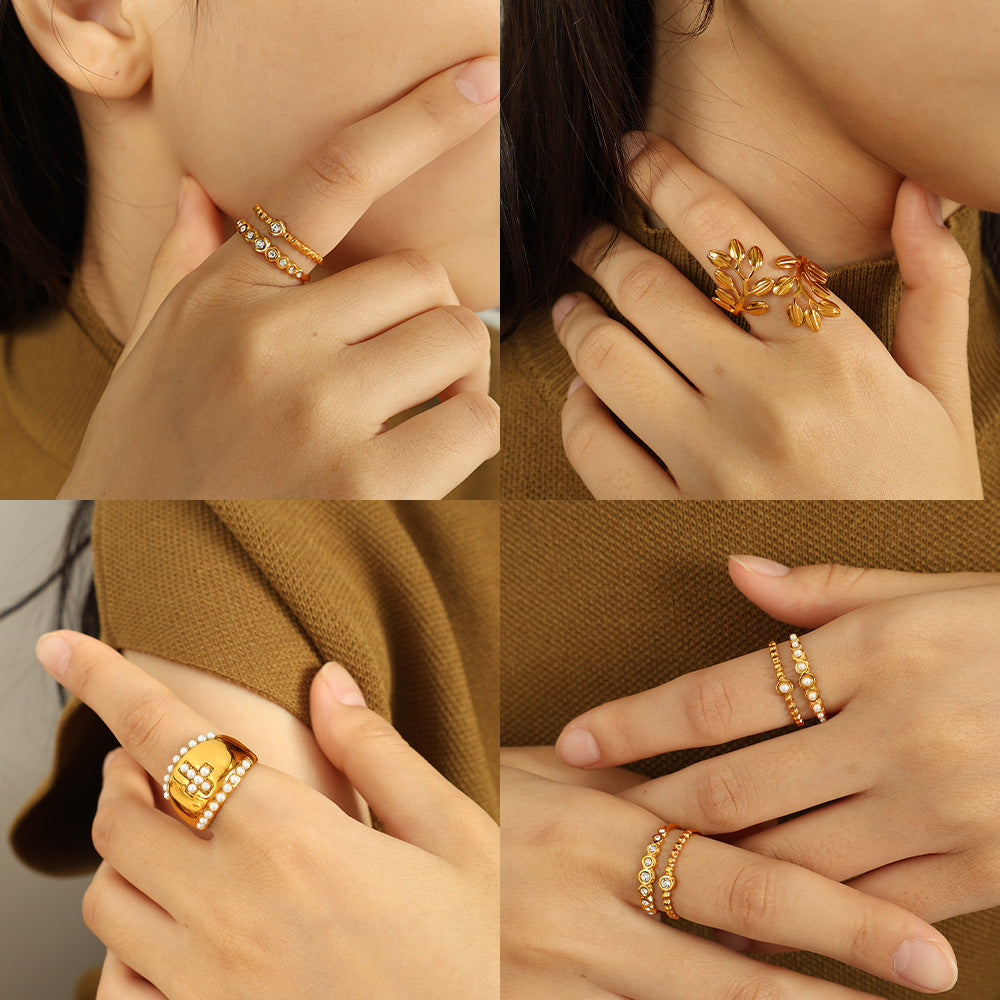 Wholesale high sense inlaid imitation pearl rhinestone ring retro titanium steel cross leaf ring jewelry