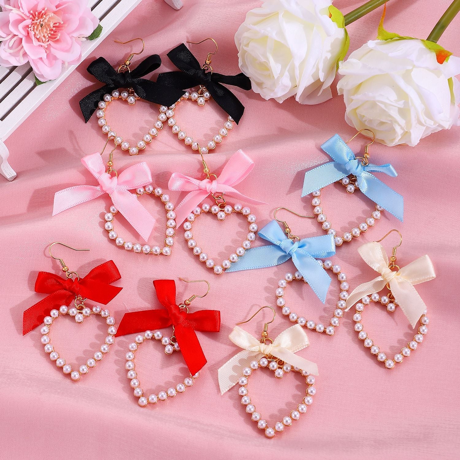 Wholesale Heart-shaped bow man-made pearl earrings