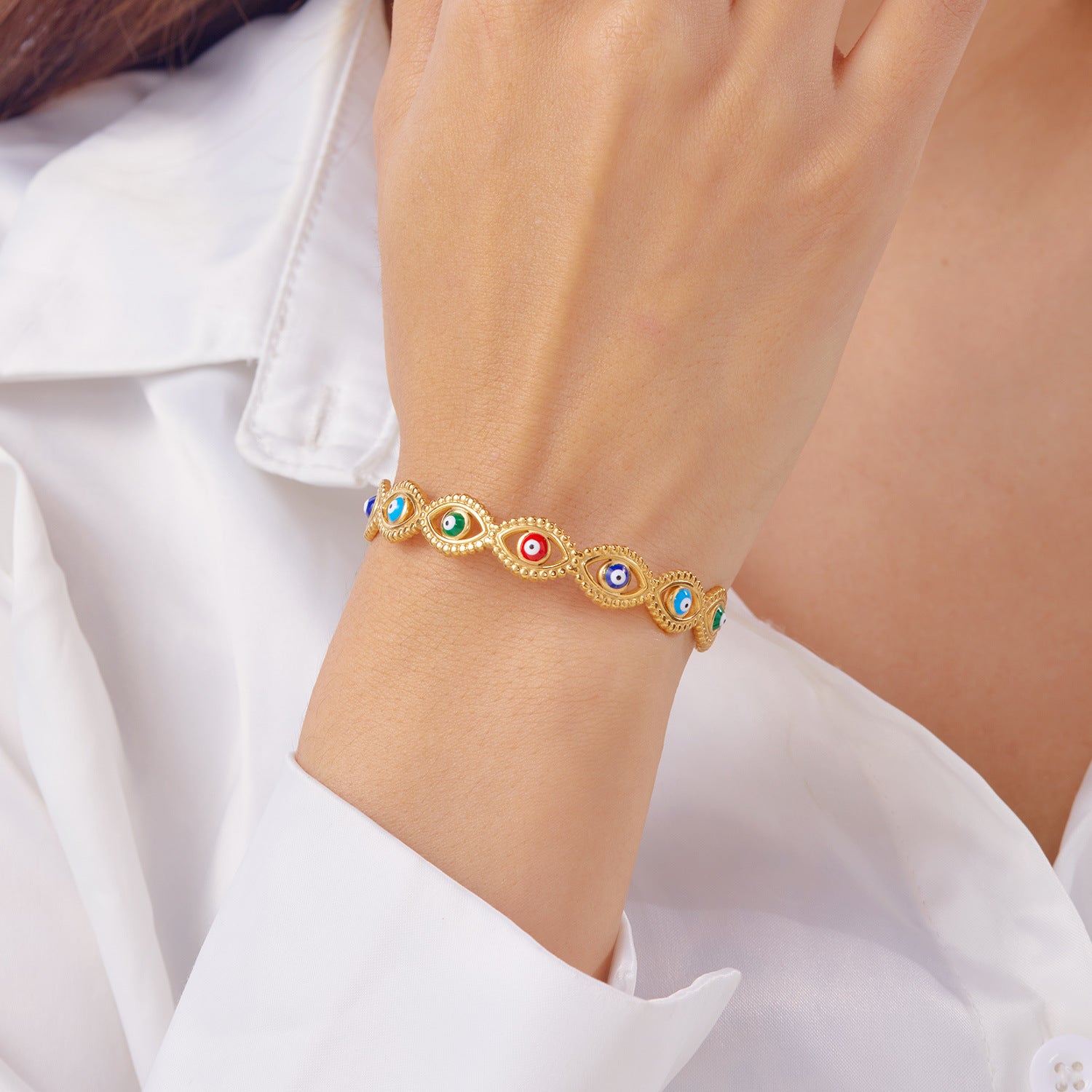 Wholesale Hollow Oil Dropping Blue Eyes Stainless Steel Bracelet