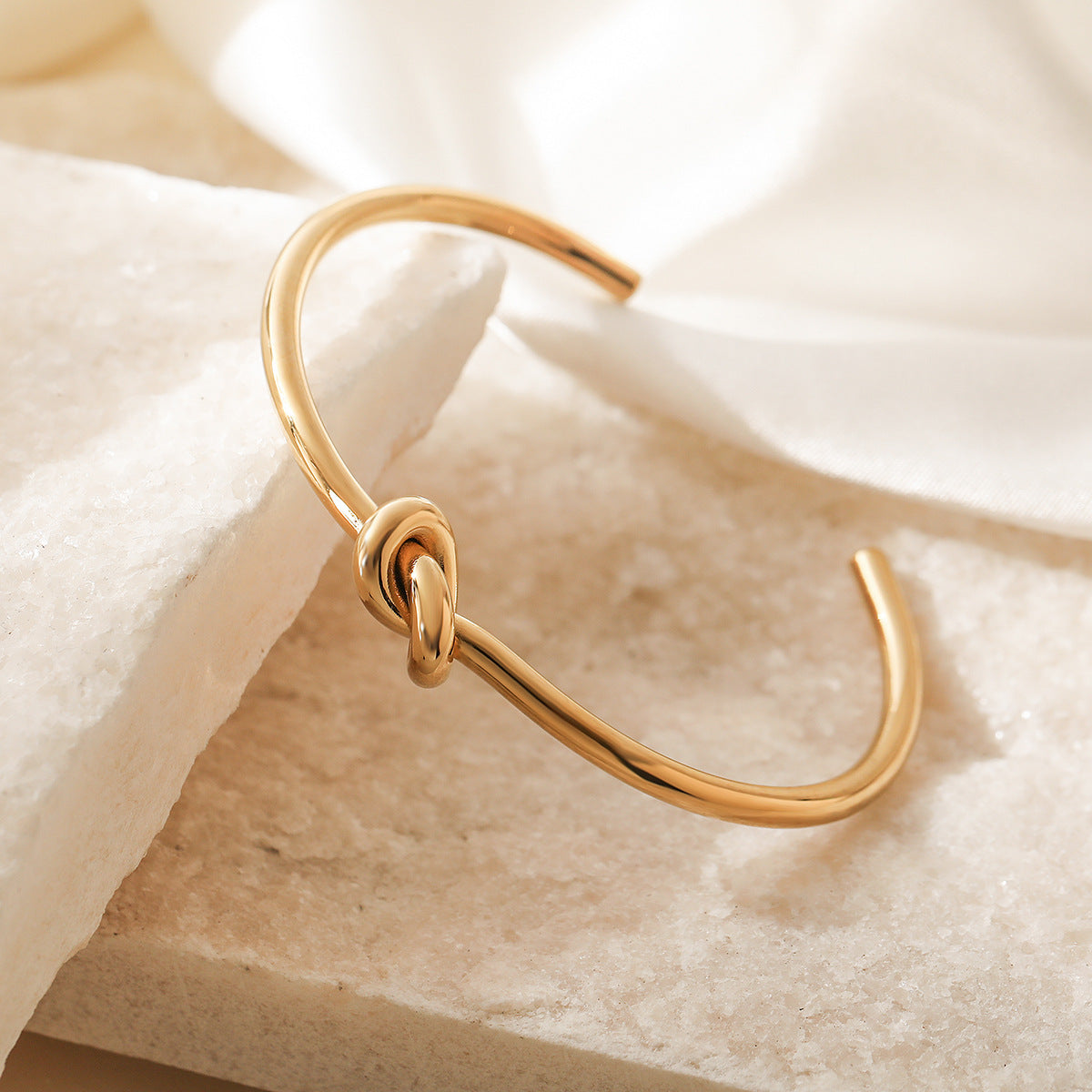 Wholesale 18K gold plated love knot open stainless steel bracelet