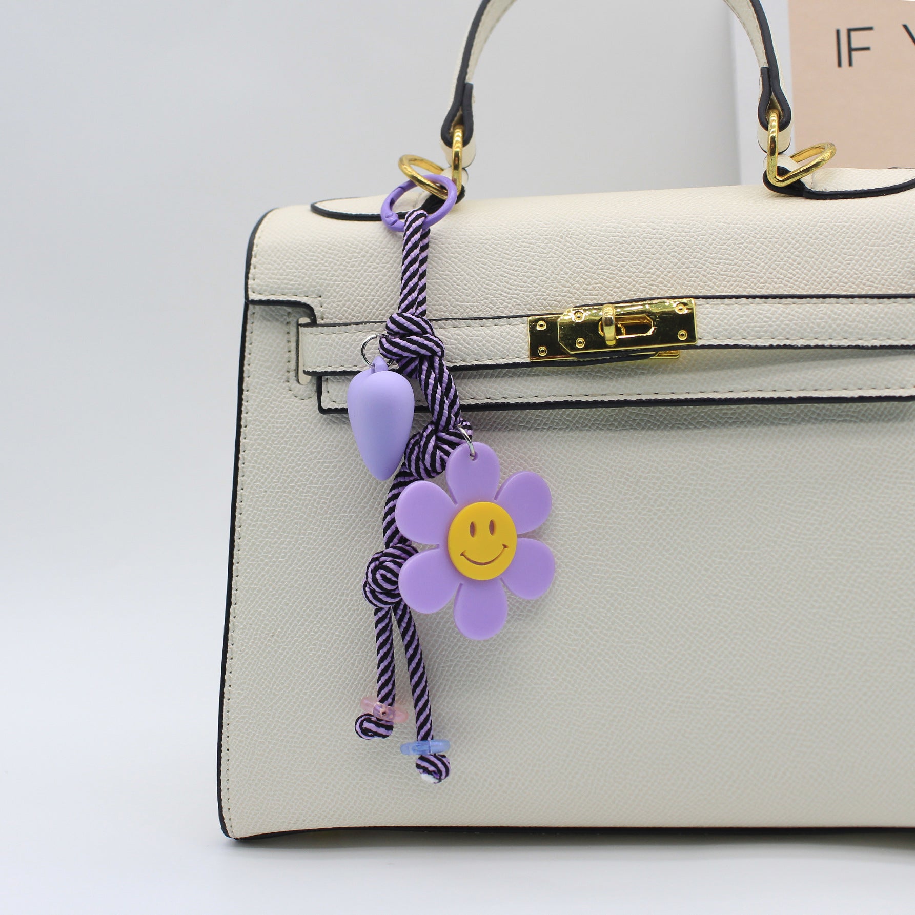 Wholesale sunflower smiley face creative keychain