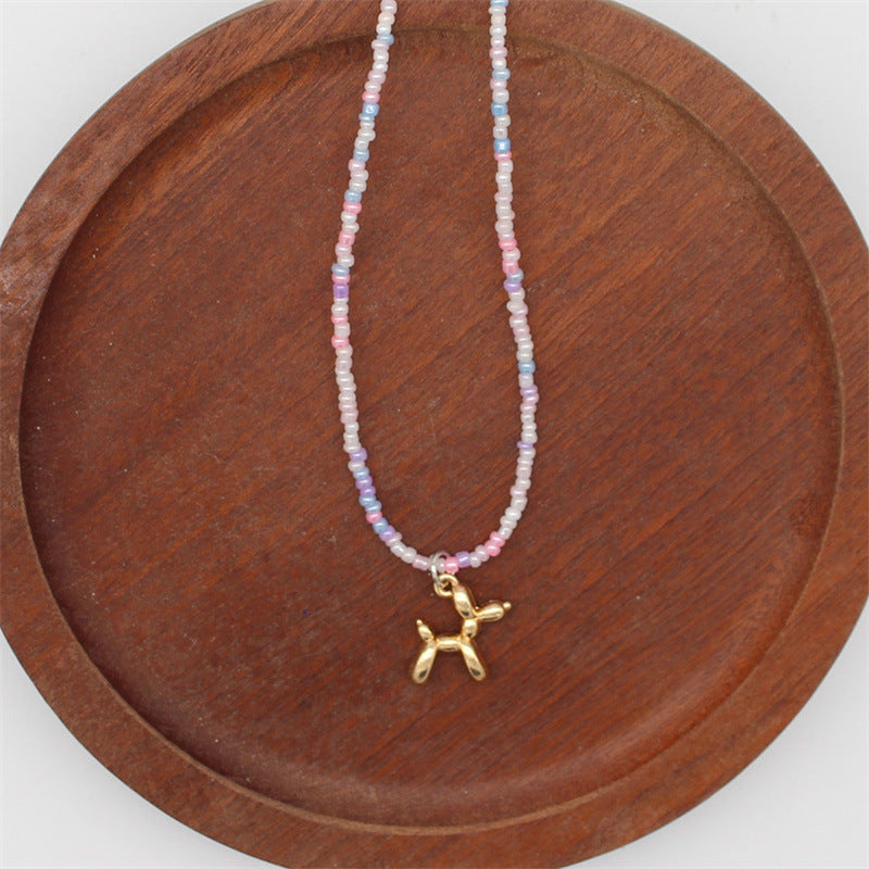 Wholesale cartoon puppy pendant macaron candy color  rice beads beaded necklace