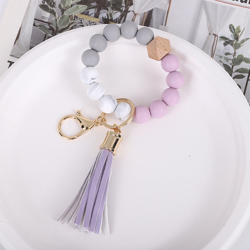 Wholesale Trendy Silicone Bead Bracelet With Tassel Wooden Bead Keychain Natural Geometry Style Chic Jewelry Accessory Gift