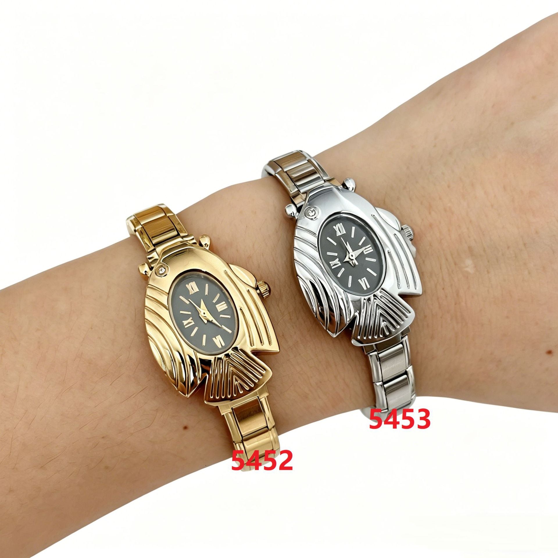 Wholesale Flying Fish Auspicious Simple Oval Quartz Wristwatch Couple Module Watch