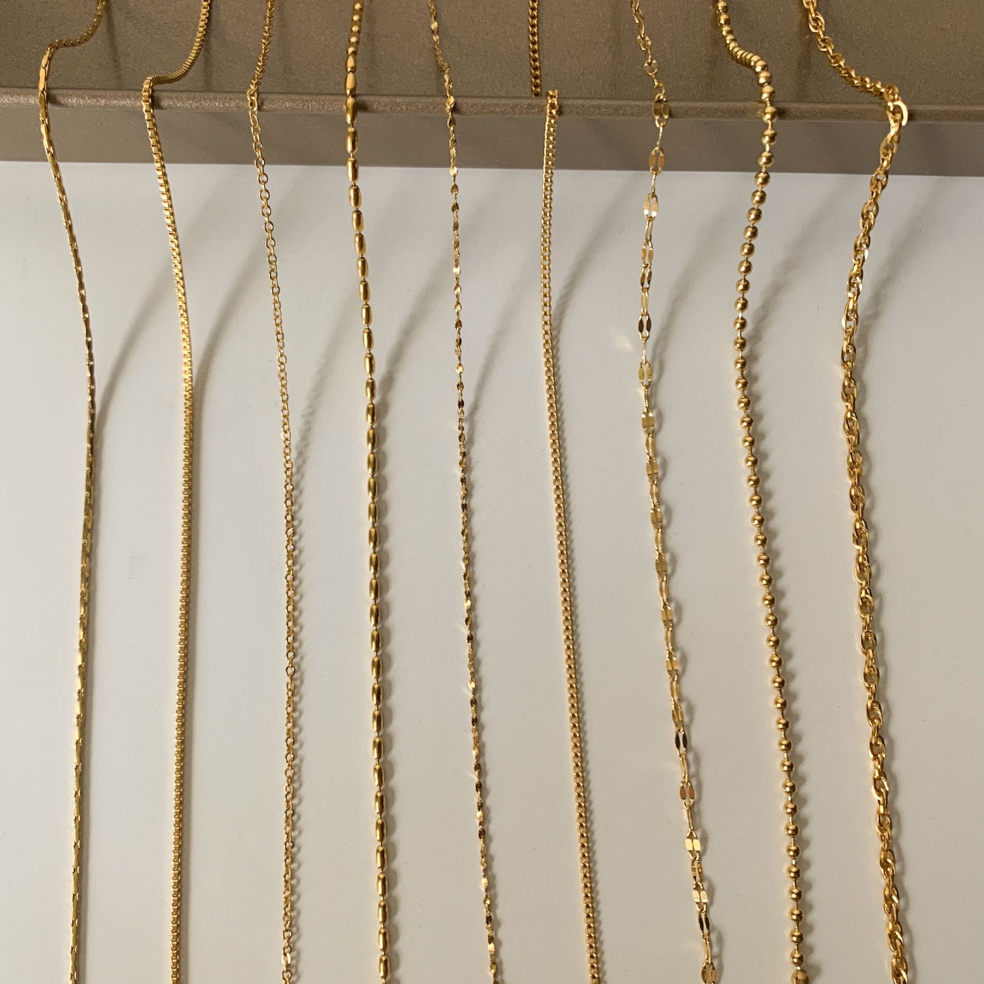 Wholesale Cross chain box chain snake bone chain titanium steel plated 24k golden sunflower clavicle chain