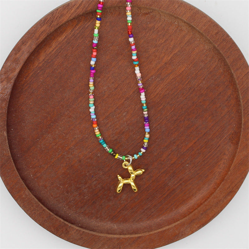 Wholesale cartoon puppy pendant macaron candy color  rice beads beaded necklace