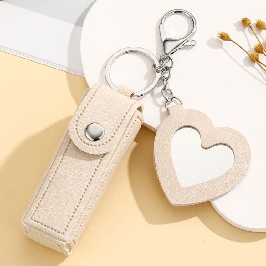 Wholesale creative leather pendant portable lipstick bag keychain makeup mirror mini key storage bag