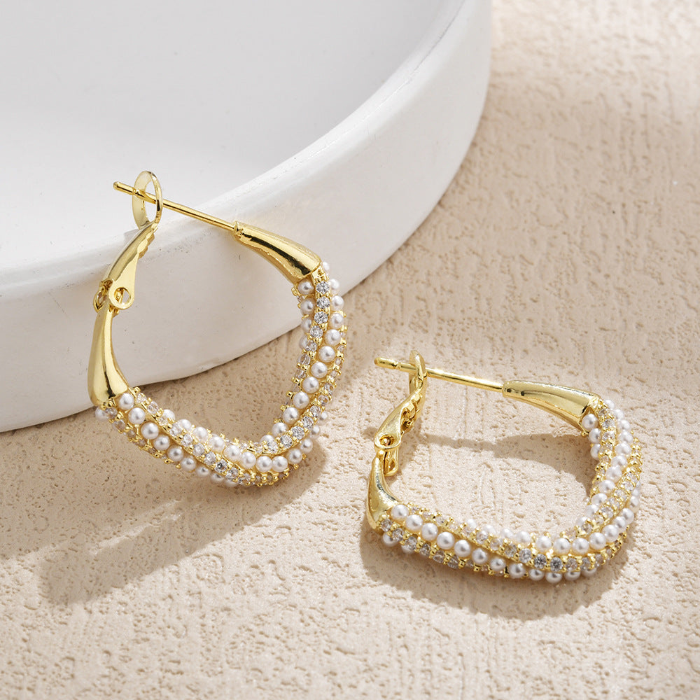 Wholesale Pearl inlaid with diamond twisted circular hoop earrings