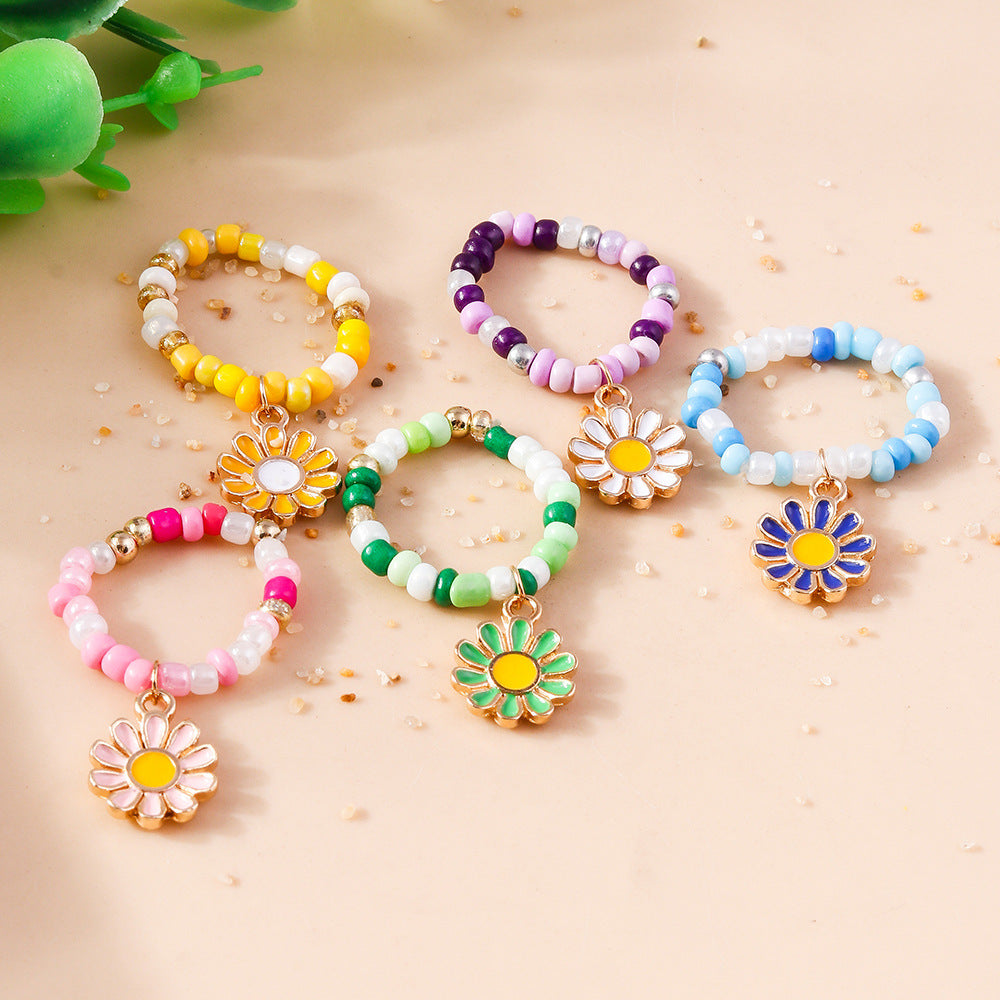Wholesale flower ring boutique refined small rice bead ring