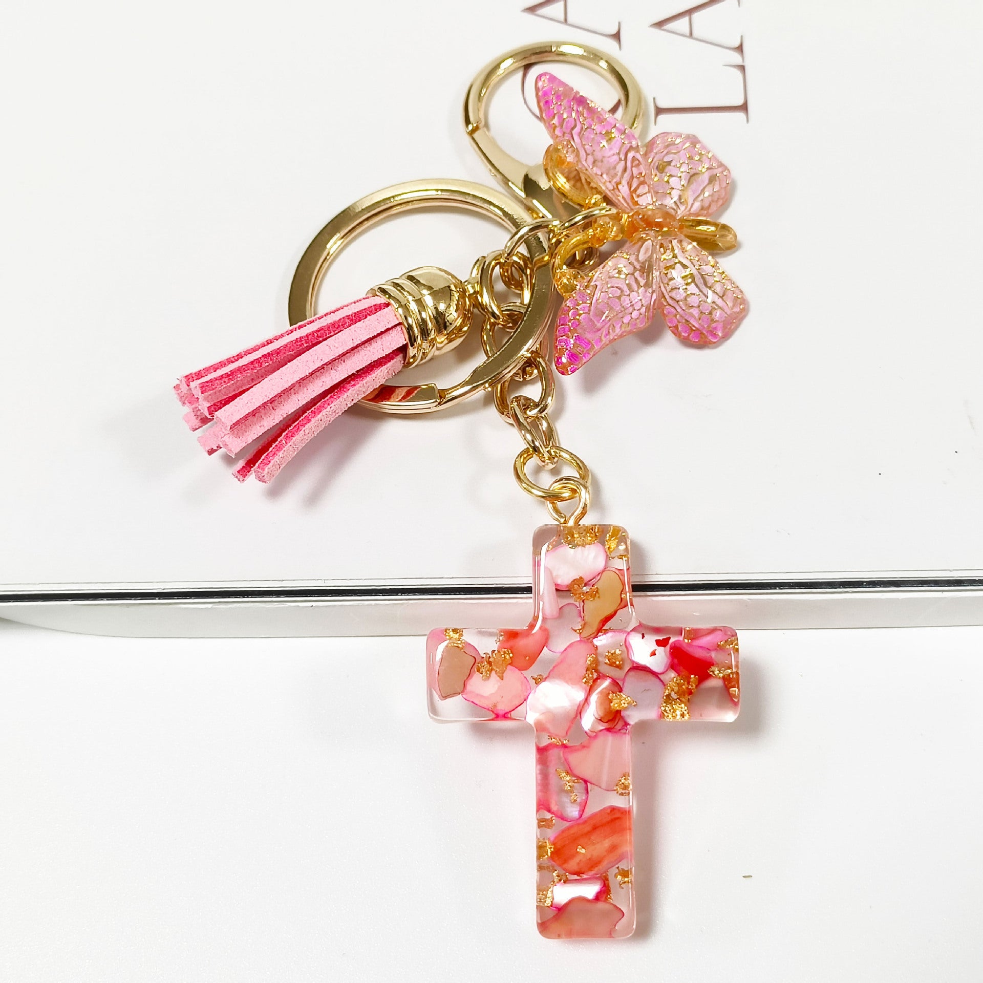 Wholesale Resin glue cross butterfly white blue tassel keychains