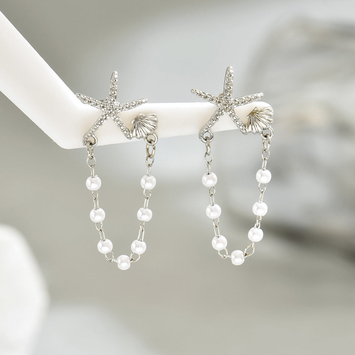 Wholesale Star Shell String Pearl Design Earrings