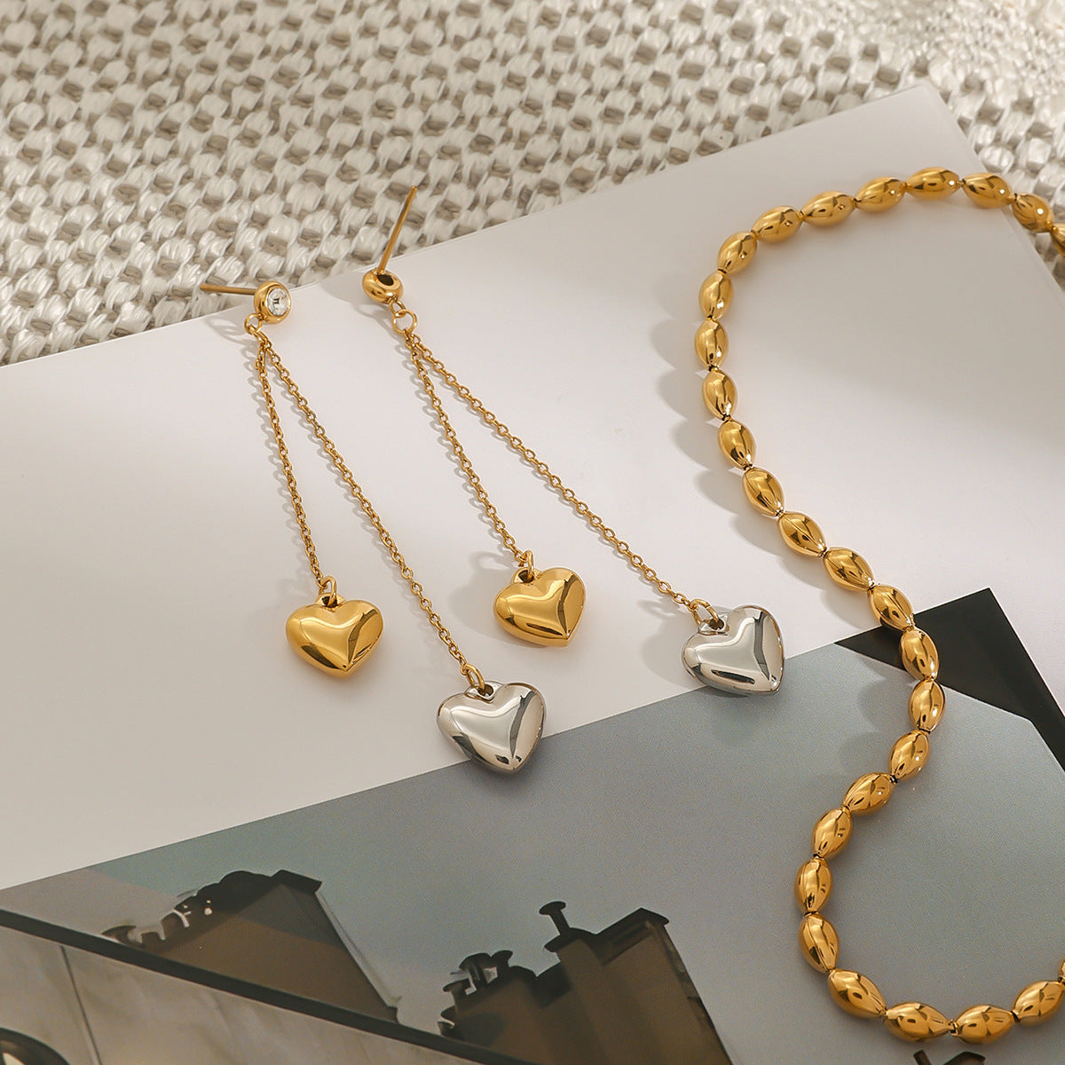 Wholesale  18k gold stainless steel white diamond gold and silver color matching smooth love tassel earrings