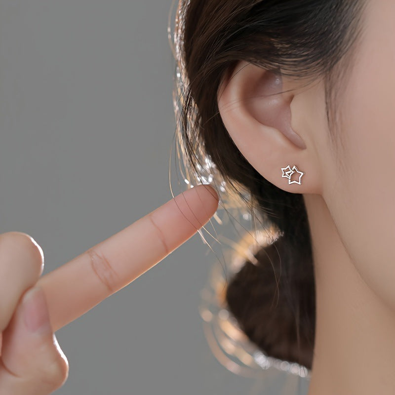 Wholesale Alloy Cute Hollow Star Earrings