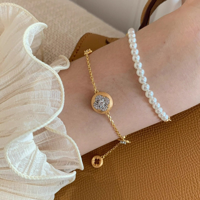 Wholesale Medium style four-leaf flower bracelet earrings set