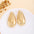 Wholesale Retro Flower Pearl Hollow Love Light Luxury Earrings