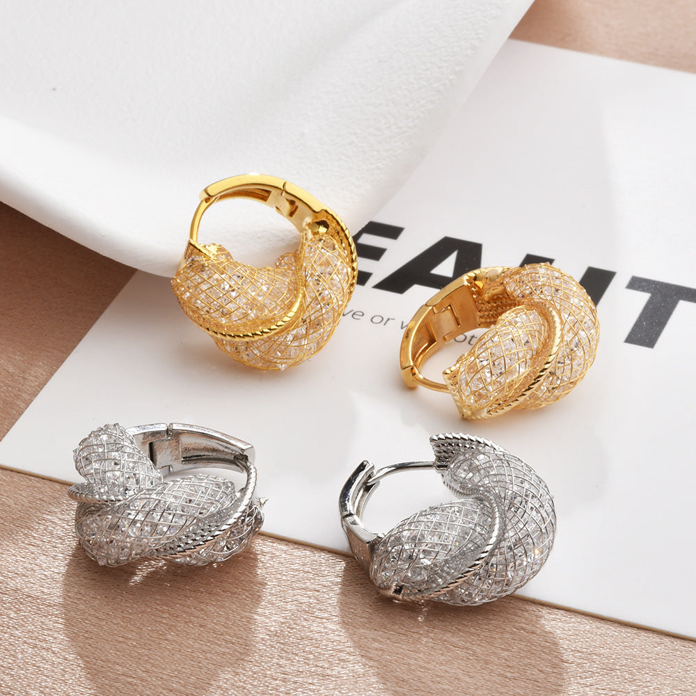 Wholesale Light luxury hollow twist earrings with glittering crystal wrap earrings
