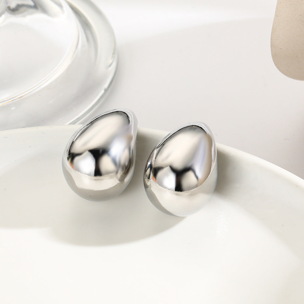 Wholesale Copper plated 18 gold hollow glossy water drop stud earrings