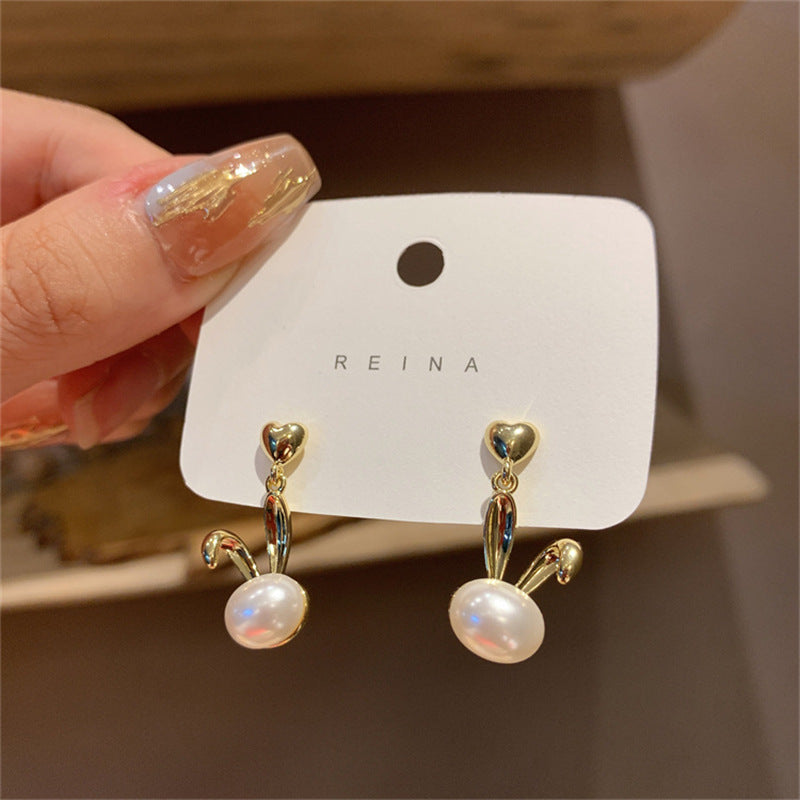 Wholesale rabbit pearl silver needle earrings