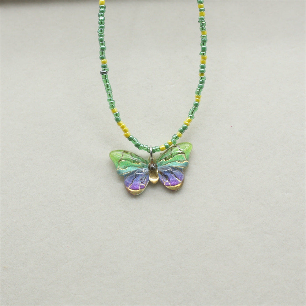 Wholesale gradient color bronzing butterfly sweet pendant rice beads beaded necklace