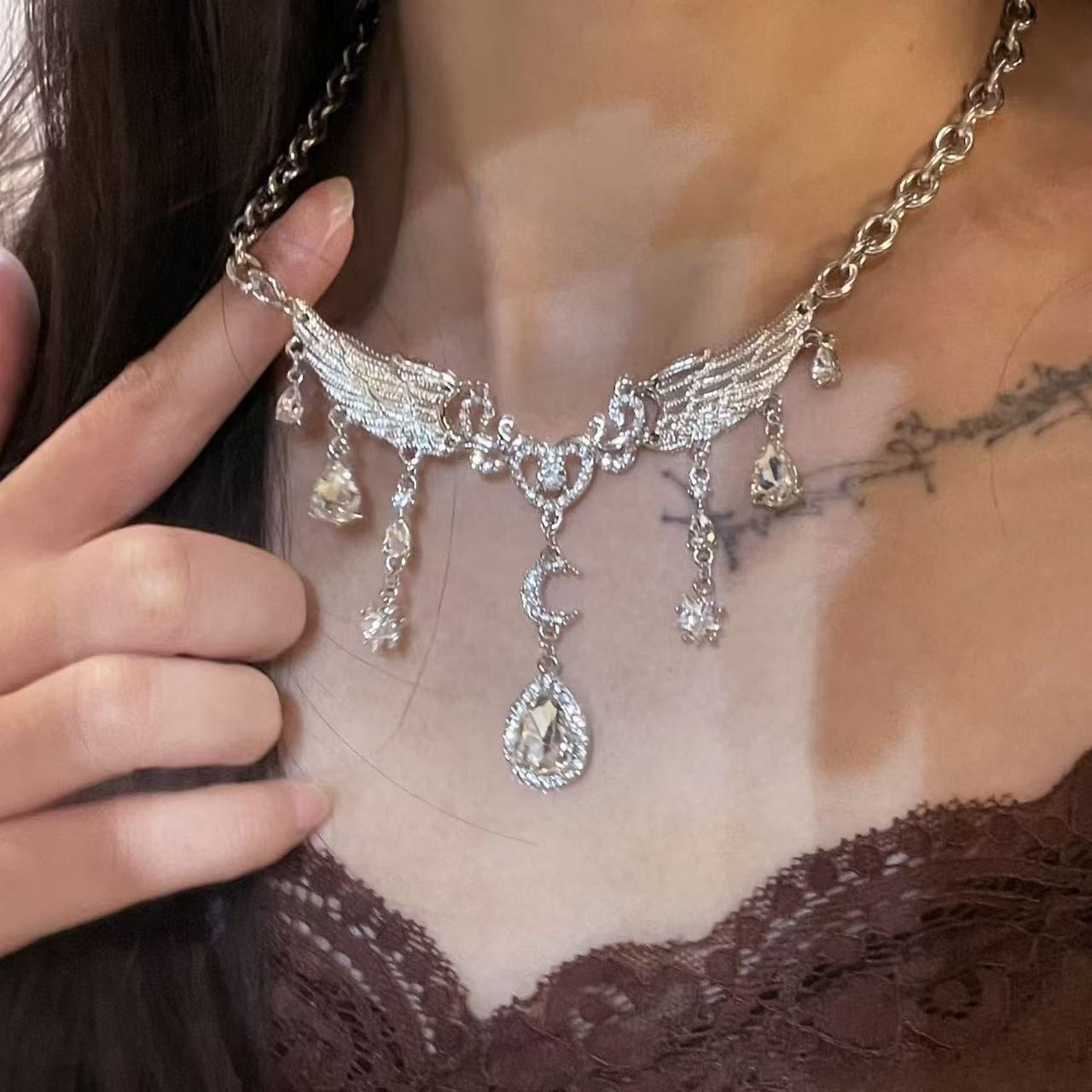 Wholesale Trendy Butterfly Star Moon Water Drop Tassel Necklace,  Silver Tone Chain,  Fashion Accessory for Boutique Resale