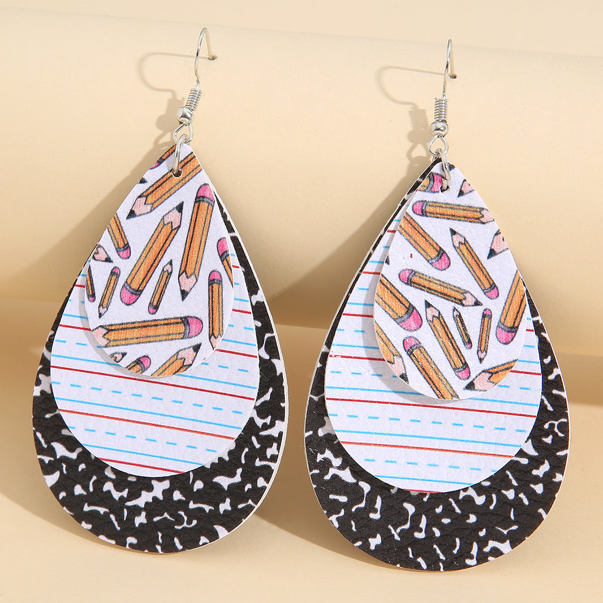 Wholesale drop-shaped three-layer graduation season printed leather earrings