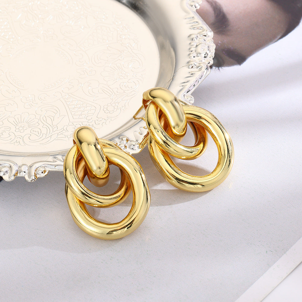 Wholesale geometric exaggerated smooth hollow tube winding earrings