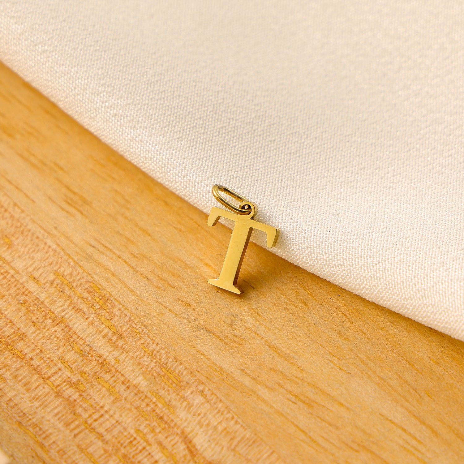 Wholesale Titanium steel letter pendant